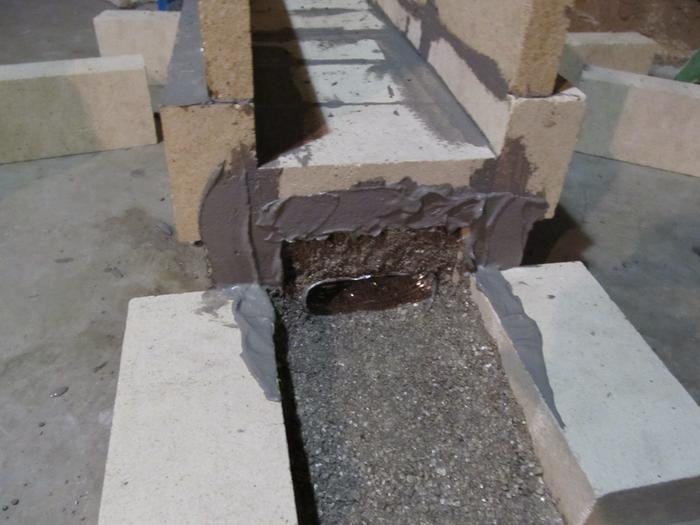 [Thumbnail for Intake pipe surrounded in vermiculite morcoset mix.JPG]